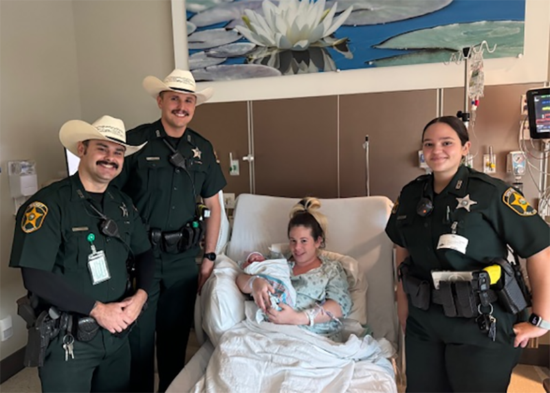 baby and deputies